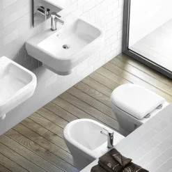 Britton Bathrooms - Curve Wall Hung WC With Soft Close Seat